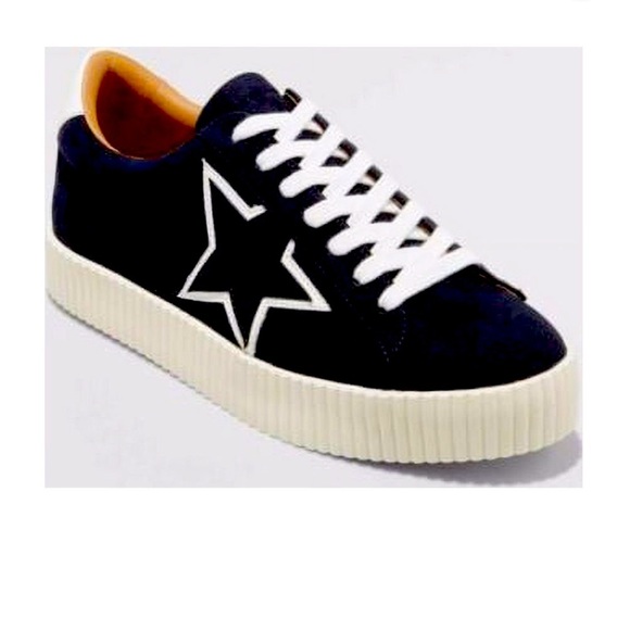 Faux-Suede navy blue sneakers with white laces and white wide soles.9.5 - Picture 1 of 5